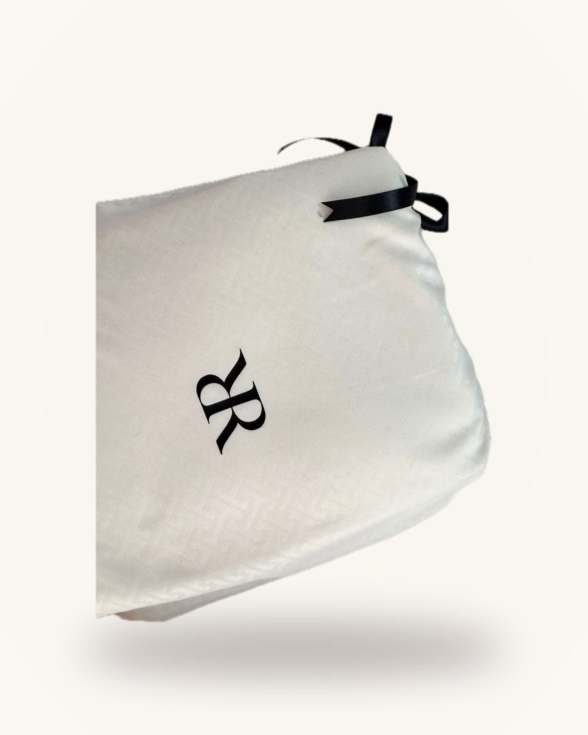 Juego de sábanas Rosas Home marfil, en su bolsa de jacquard