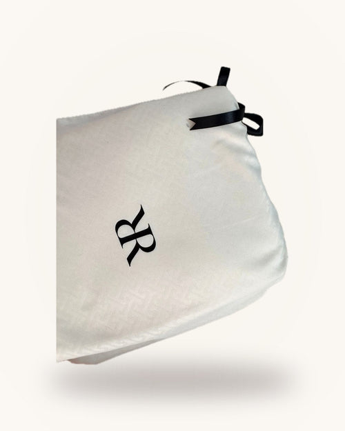 Juego de sábanas Rosas Home marfil, en su bolsa de jacquard